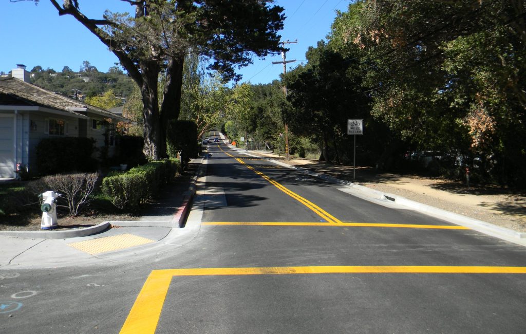 Street view of new ADA sidewalks, crosswalks, and streetscape improvements from APWA award-winning project in Belmont, California