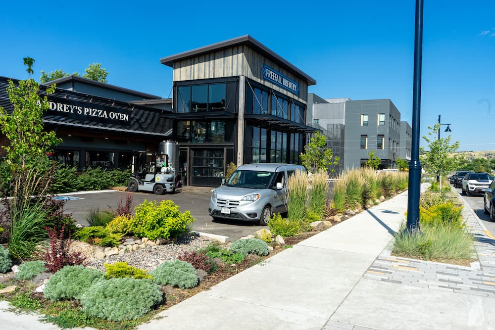 View of a new building showcasing community-focused design by the placemaking studio at Sanbell