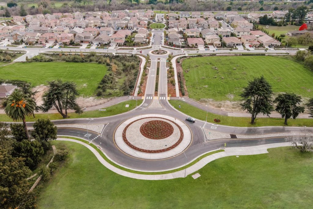 Aerial of the Heckler Roundabout in Gilroy, showcasing the circular traffic design, surrounding roadways, and landscaping