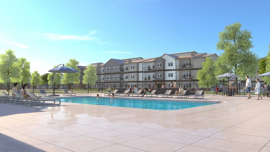 3D rendering of the pool with apartments in the background for the Interurban Apartments in Billings, Montana.